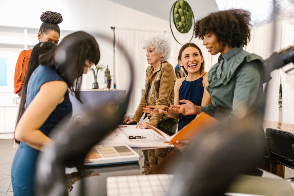 a group of women discussing about business